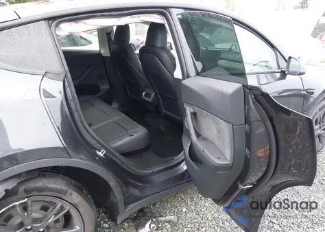 2025 Tesla Model Y Long Range Dual Motor Rear-Wheel Drive from USA, damaged, VIN 7SAYGDED5SF258801